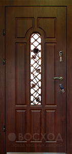 Фото  Стальная дверь Дверь с ковкой №10 с отделкой Массив дуба