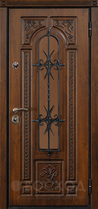 Фото стальная дверь Дверь с ковкой №7 с отделкой Массив дуба