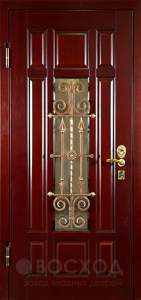 Фото  Стальная дверь Дверь в ковкой №5 с отделкой Массив дуба
